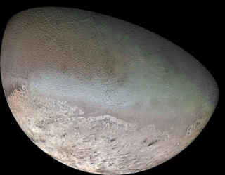 Illustration for article titled This Is The Most Detailed Map of Neptune's Moon Triton